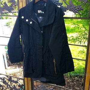 Gilmore black polyester mid thigh lightweight jacket with hidden hood si…